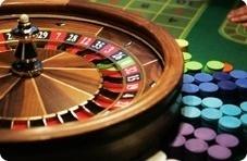 Roulette wheel and stacks of casino chips, from Springbok's comp points artwork